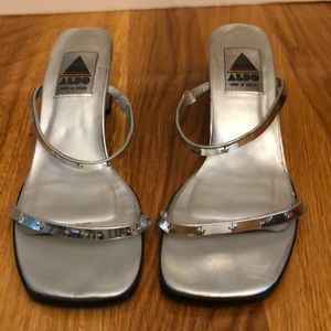 Vintage Aldo silver mules with pyramid heels